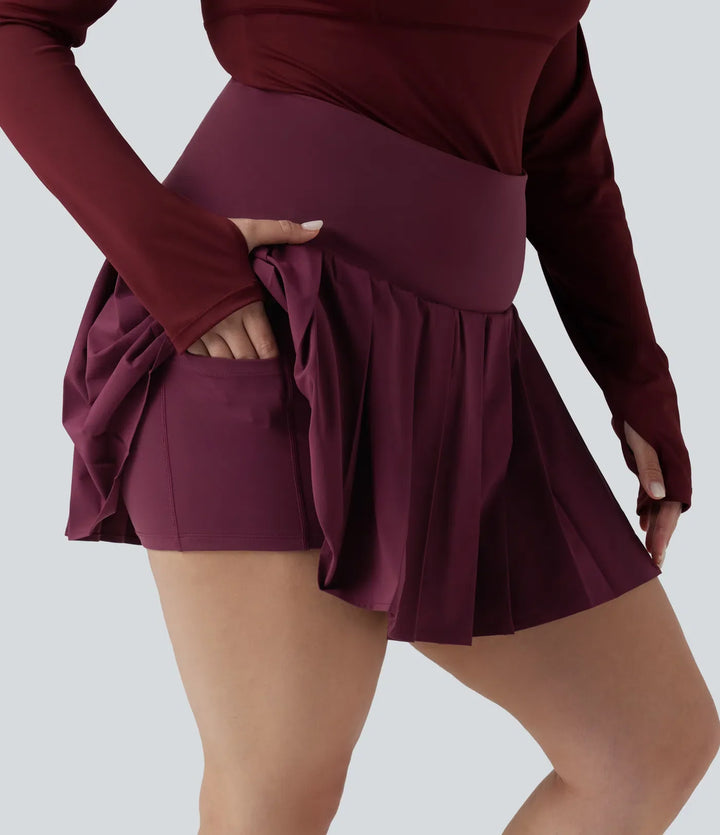Plusstorlek Breezeful med hög midja plisserad 2-i-1 asymmetrisk fåll snabbtorkande mini yoga kjol med fickor