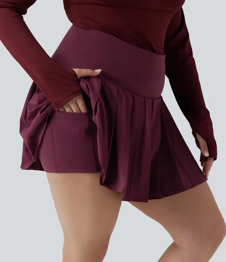 Plusstorlek Breezeful med hög midja plisserad 2-i-1 asymmetrisk fåll snabbtorkande mini yoga kjol med fickor