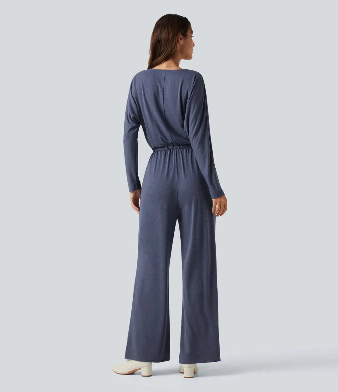 V-ringad långärmad arbetsjumpsuit med fickor
