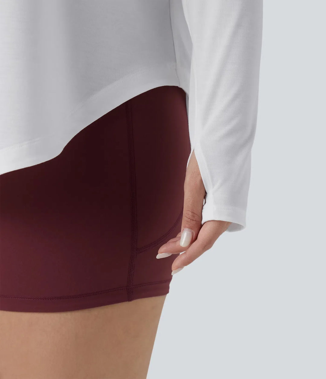 Enaxlad långärmad tumhål rundad fåll hög-låg snabbtorkande yoga plusstorlek sporttopp-inbyggd BH