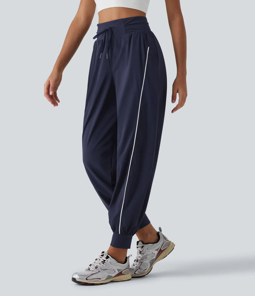 Högmidjad färgblock dragsko snabbtorkande InstantCool löparjoggers med fickor