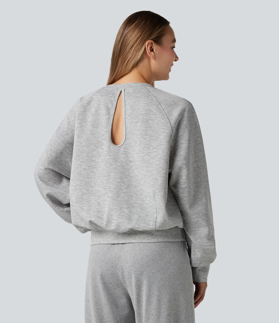 Rund hals långärmad skuren-ut vardaglig sweatshirt med fickor