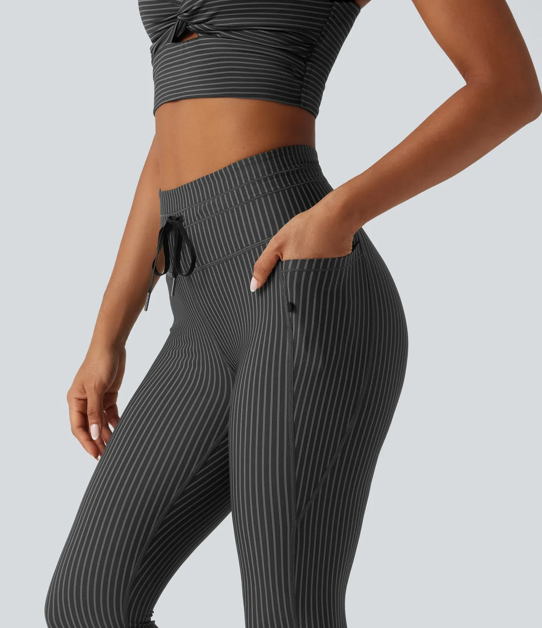 Med hög midja dragsko rand yogaleggings med fickor