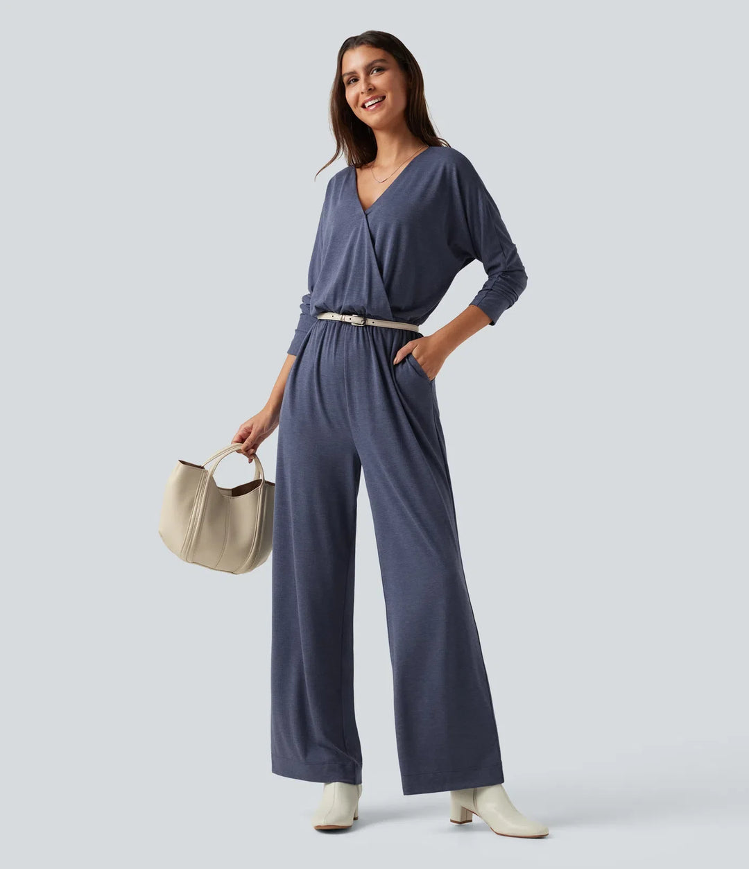 V-ringad långärmad arbetsjumpsuit med fickor