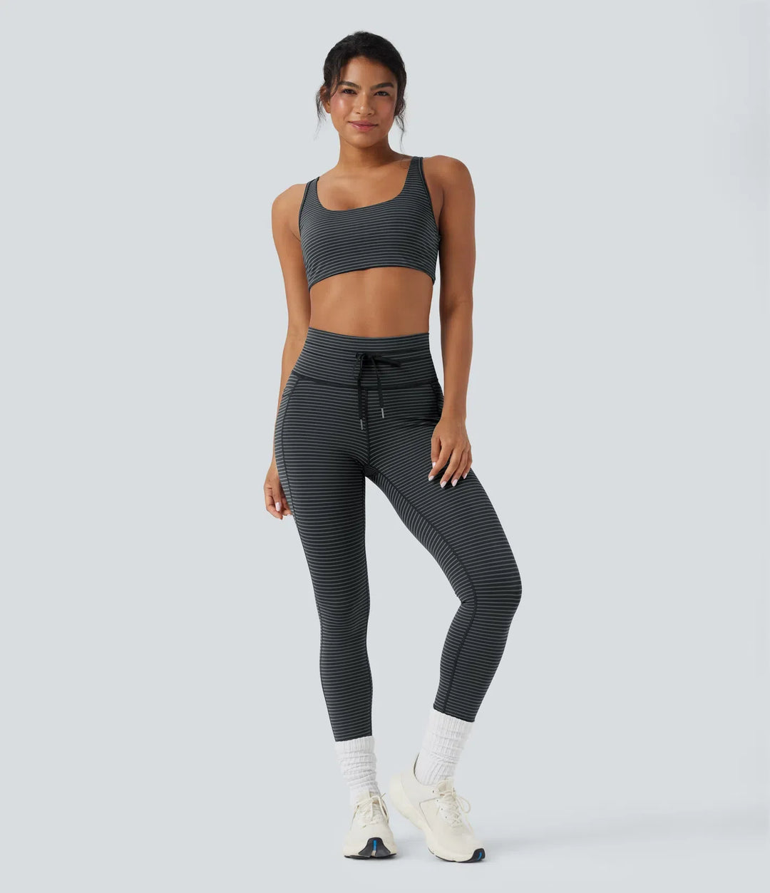 Högmidjad dragsko randig yogaleggings med fickor
