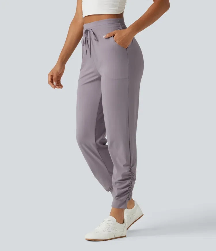 Halara UltraSculpt med hög midja dragsko rynklad yoga joggingbyxor med fickor