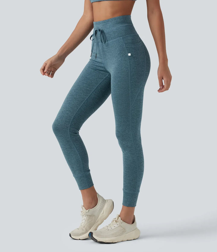 Halara UltraSculpt melerad med hög midja dragsko snabbtorkande yoga 7/8 leggings med fickor