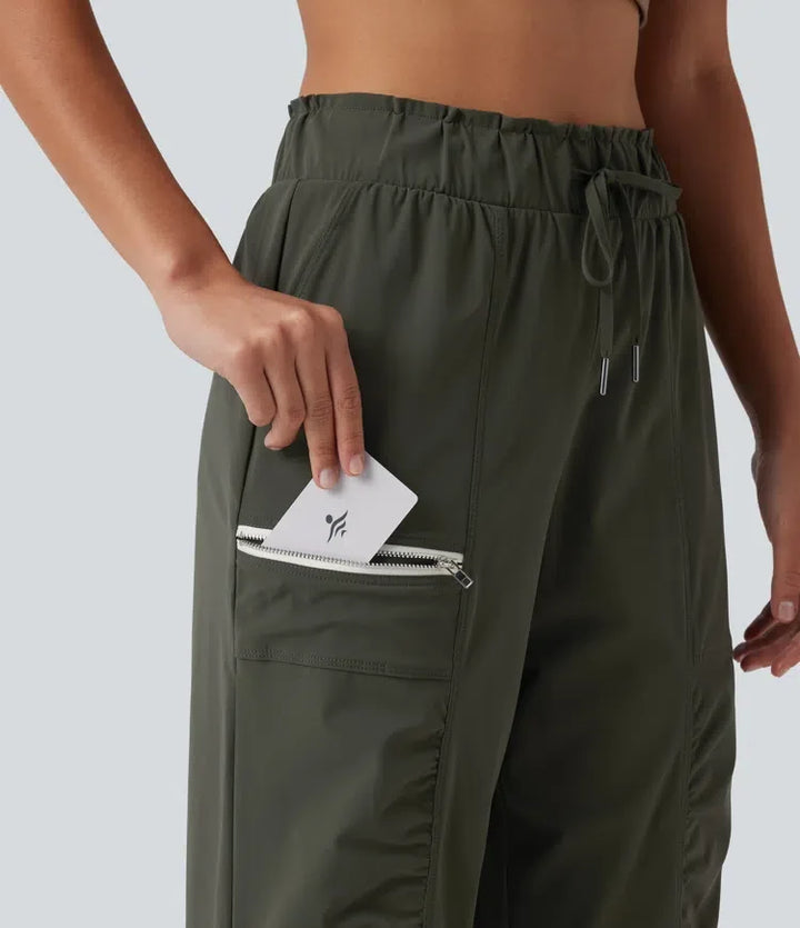 Med medelhög midja dragsko rynklad avsmalnande snabbtorkande InstantCool löpning joggingbyxor med fickor – UPF40+