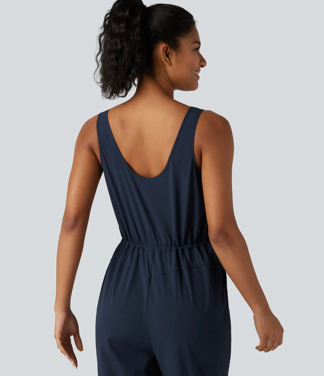 V-ringad dragsko rundad fåll vandring jumpsuit med fickor