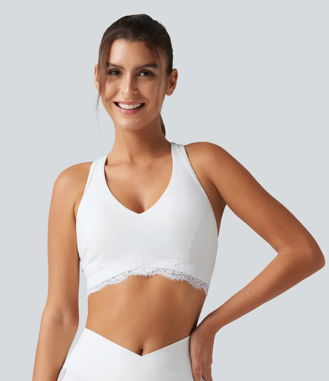 Halara UltraSculpt lätt stöd V-ringning inbyggd bh brottarrygg kontrastspets träning sport-bh