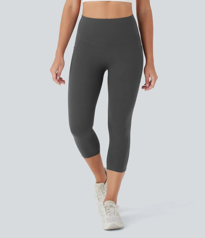 Halara UltraSculpt med hög midja rumplyftande magkontroll ficka formande capri träningsleggings