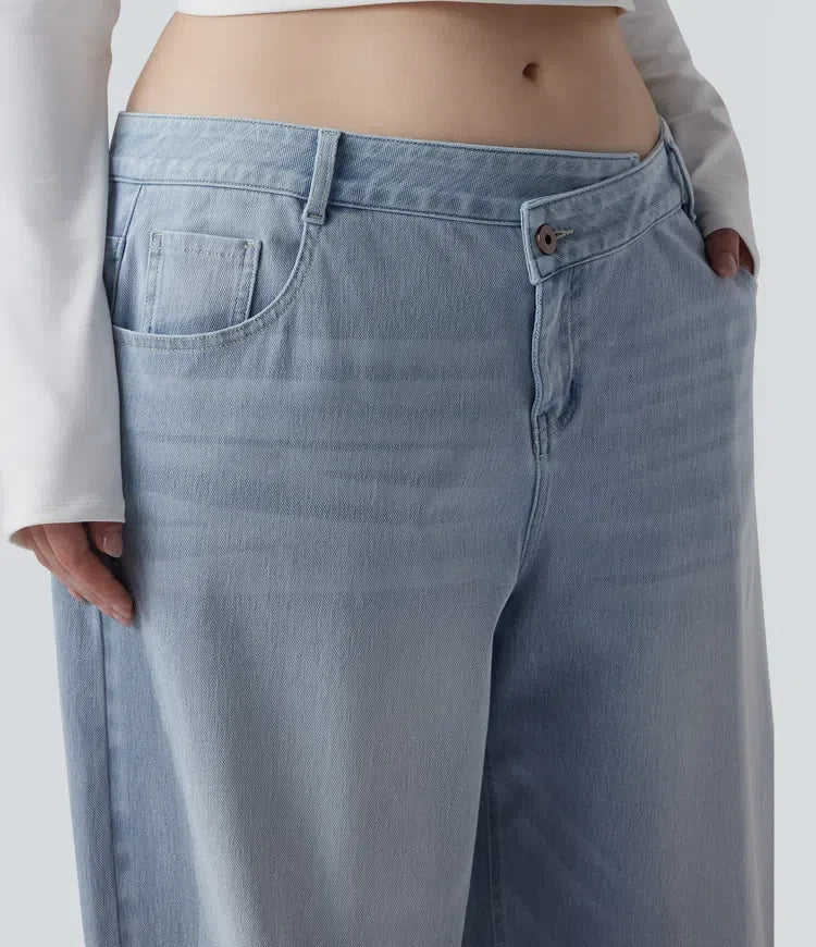Plusstorlek Halara Flex asymmetrisk med låg midja vida ben tvättad vardagsjeans med fickor