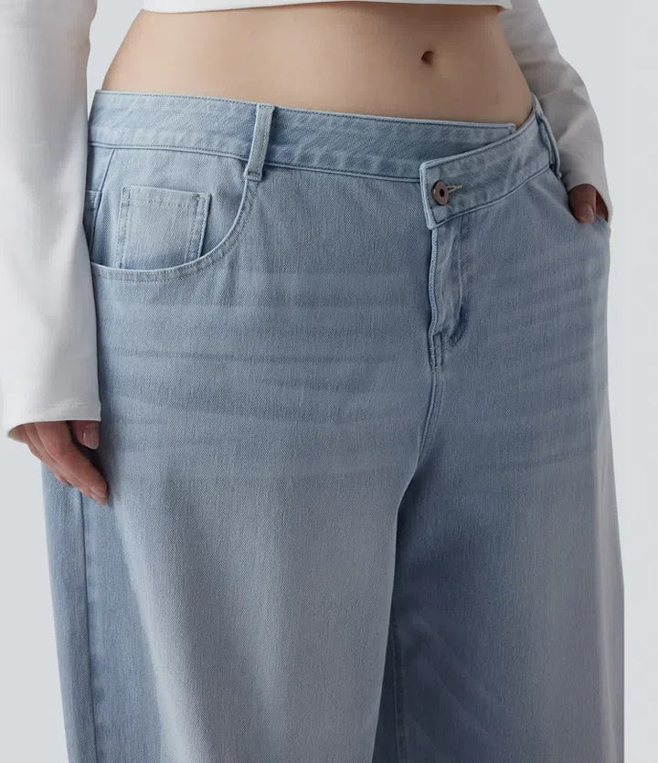 Plusstorlek Lyckera Flex asymmetrisk låg midja vida ben tvättad vardagsjeans med fickor