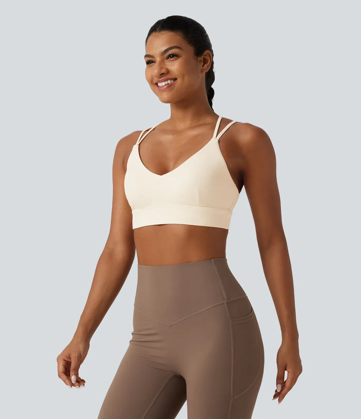 SoftlyZero Plush lätt stöd inbyggd bh korsad sport-bh för yoga