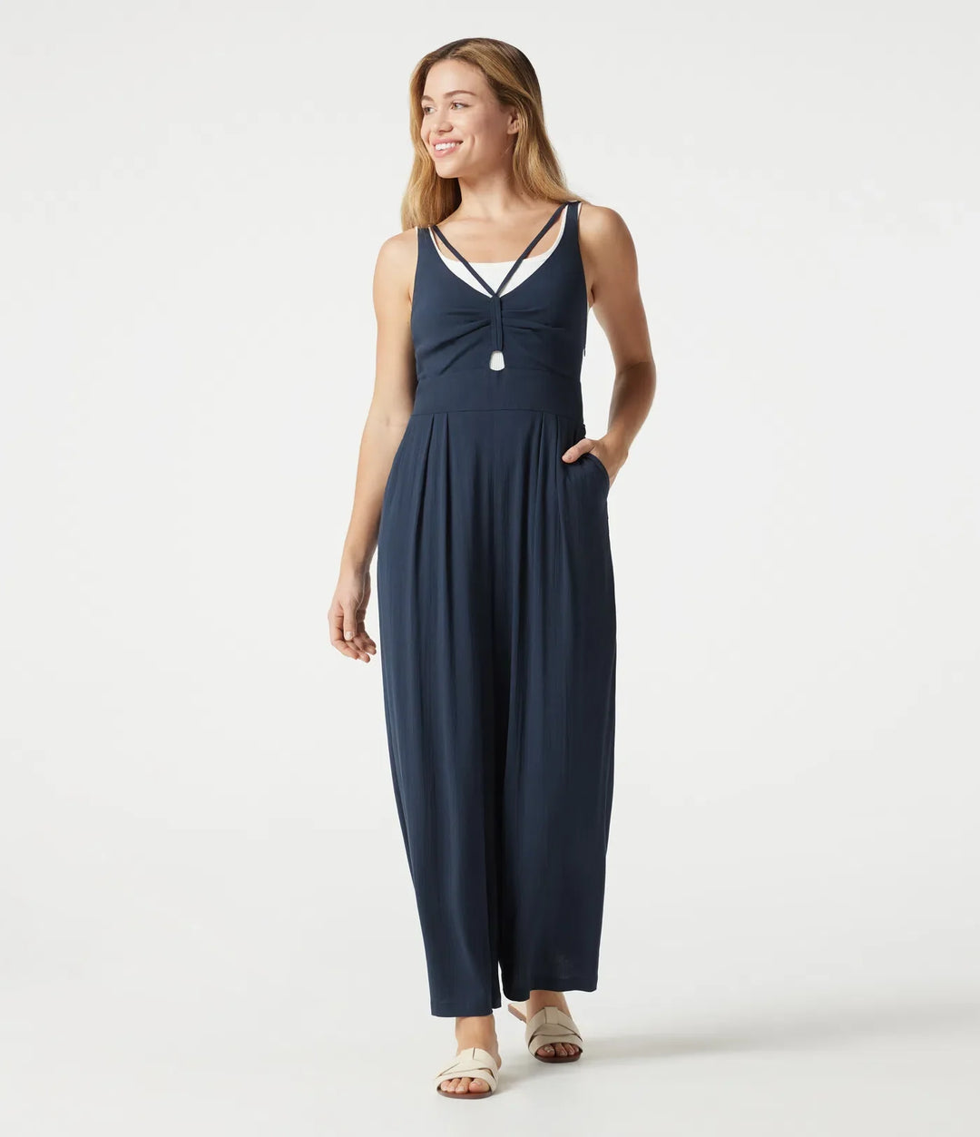 V-ringad ärmlös smockad vardaglig baggy jumpsuit med fickor