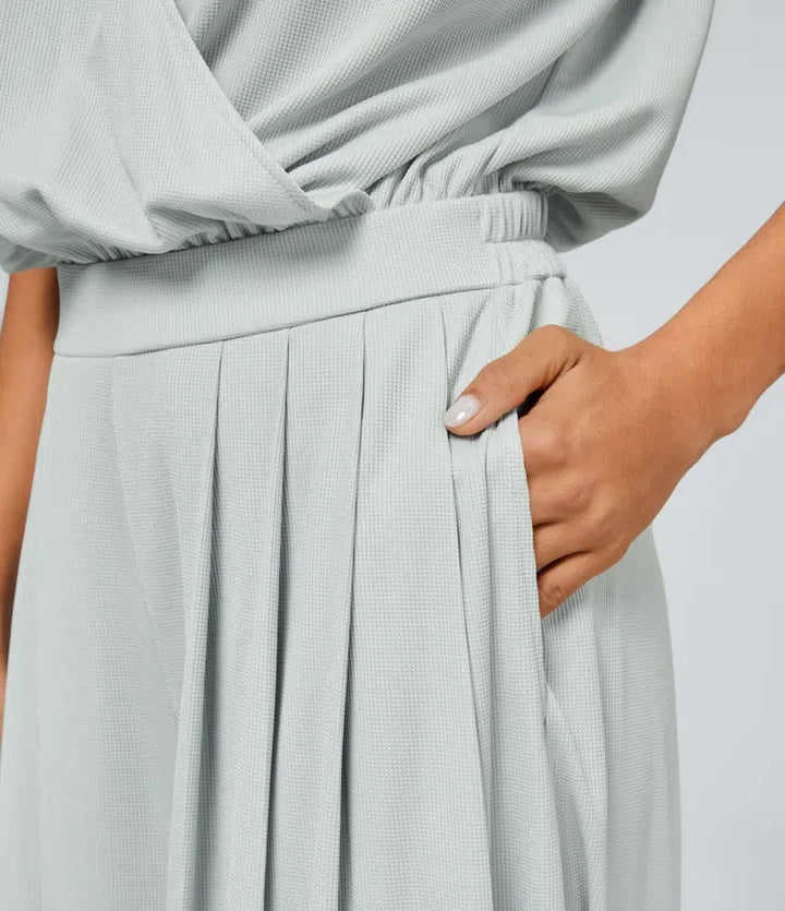 V-ringning kortärmad sidoficka vida ben följsam våffelstruktur jumpsuit för vardag