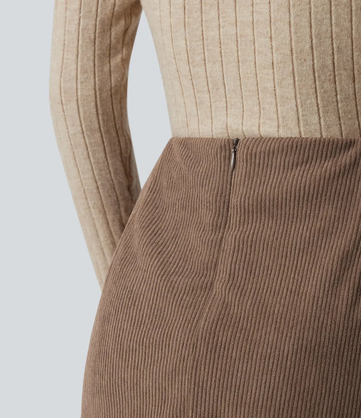 Med hög midja bak dragkedja slits i nederkanten 2-i-1 manchester vardagskjol – längre modell