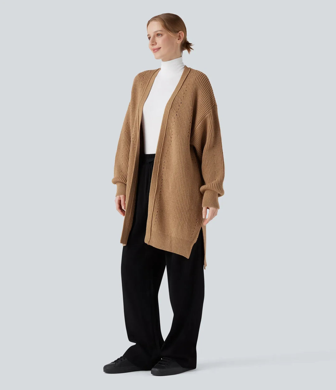 Lång bishopärm slits fåll hålmönstrad vardaglig lång modell cardigan