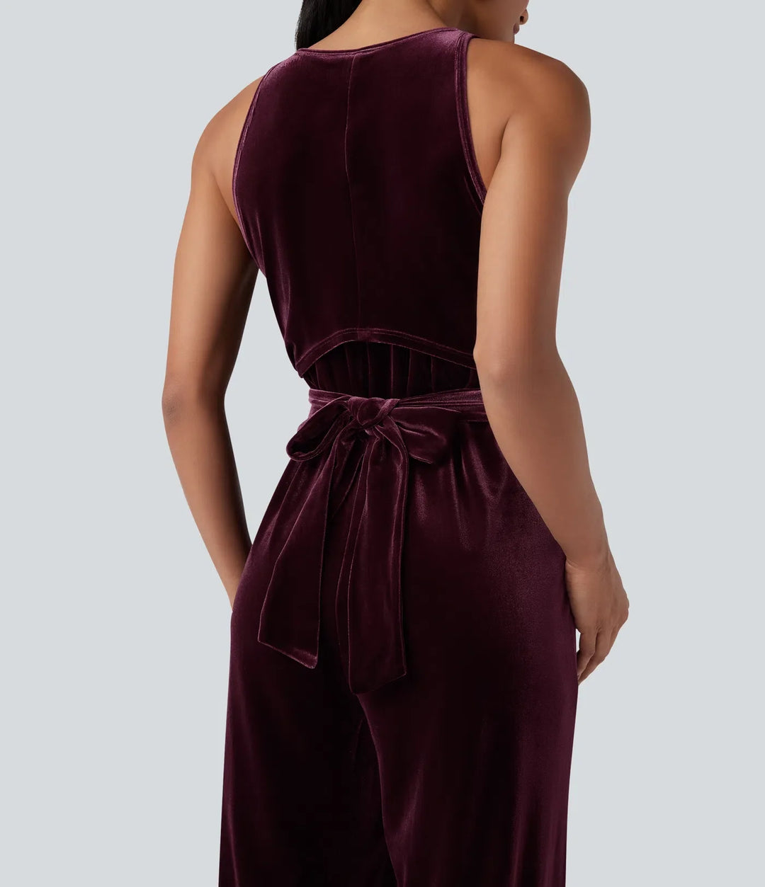 Rund hals ärmlös knytning i ryggen sammet fest jumpsuit med fickor