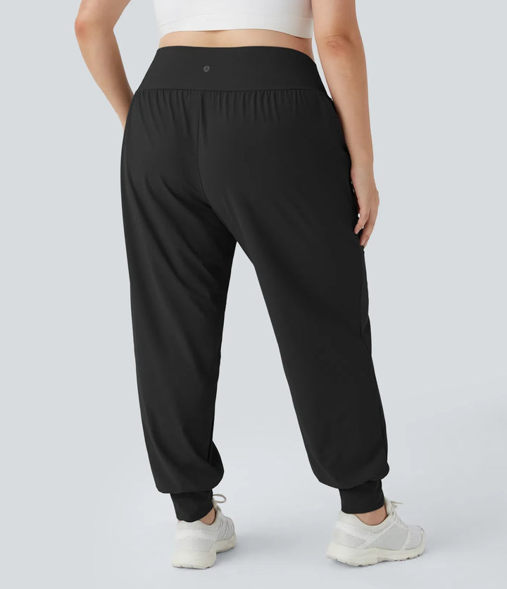 Högmidjad enfärgad ficka yoga plusstorlek joggers