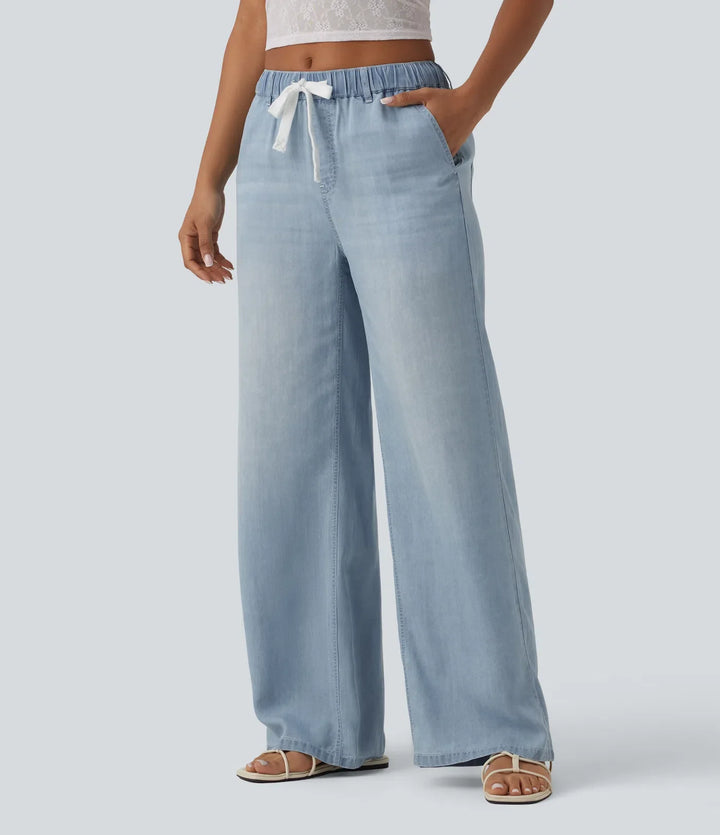Medelhög midja dragsko vardagsjeans med fickor