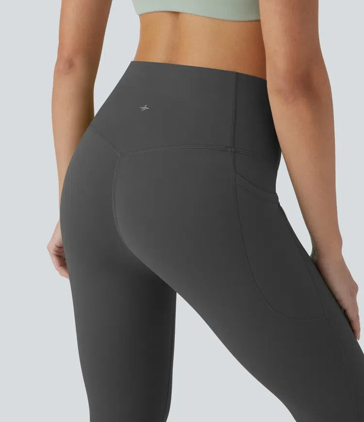 Halara UltraSculpt med hög midja och magkontroll piratbyxor yogaleggings med fickor