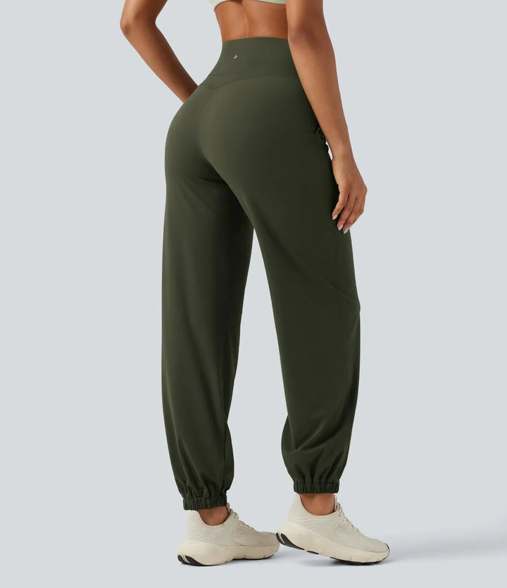 Halara UltraSculpt med hög midja och magkontroll avsmalnande yoga joggingbyxor med fickor