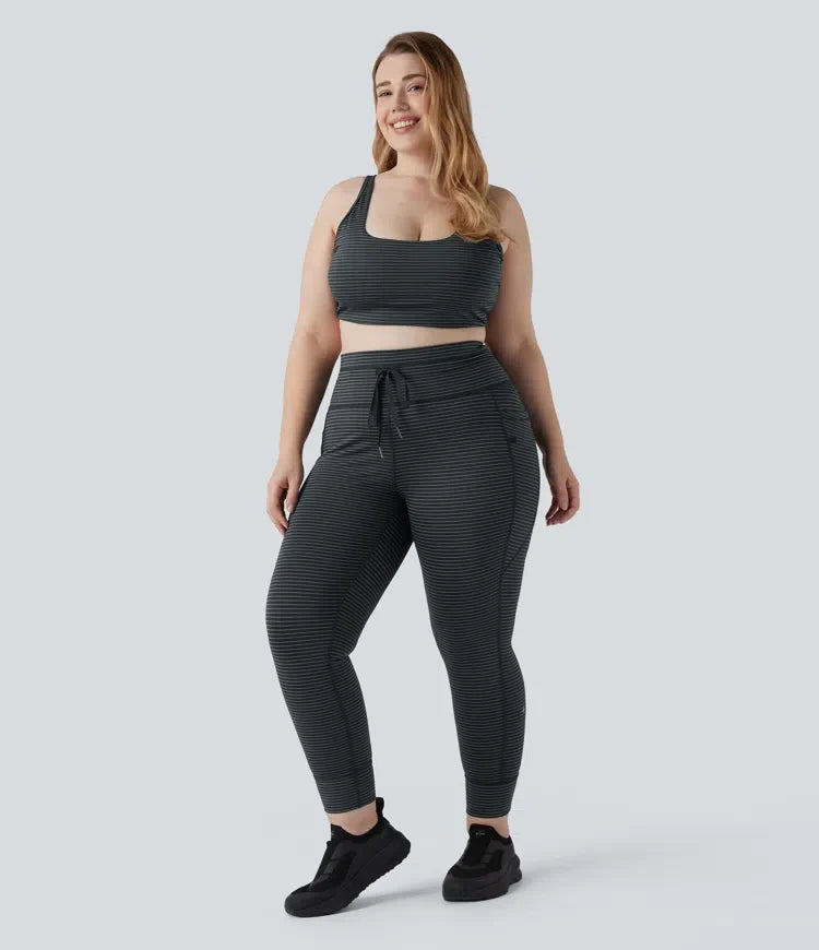 Med hög midja dragsko randig yoga leggings i plusstorlek med fickor