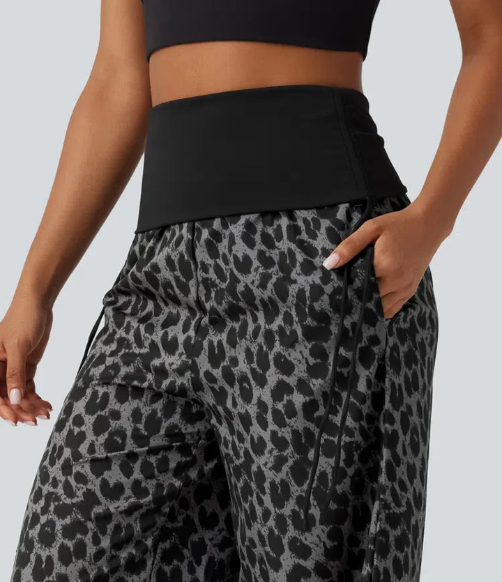 Vikbar midja med hög midja rynklad dragsko baggy leopardmönstrad vardagsbyxor med fickor