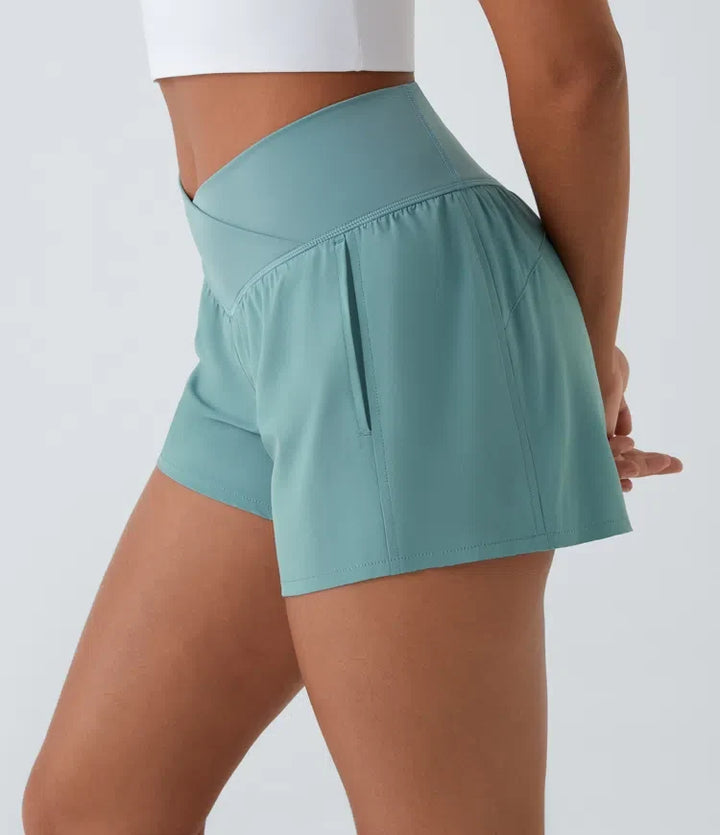 Breezeful med hög midja, omlottmidja och ficka 2-i-1 snabbtorkande yogashorts 4"