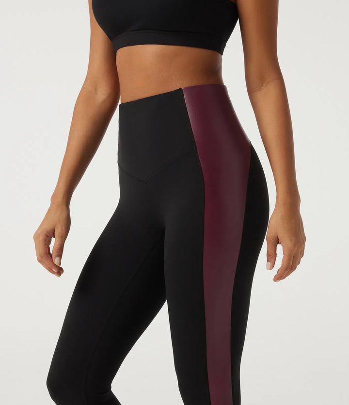 Högmidjad magkontroll färgblock stretchig PU yogaleggings med ficka
