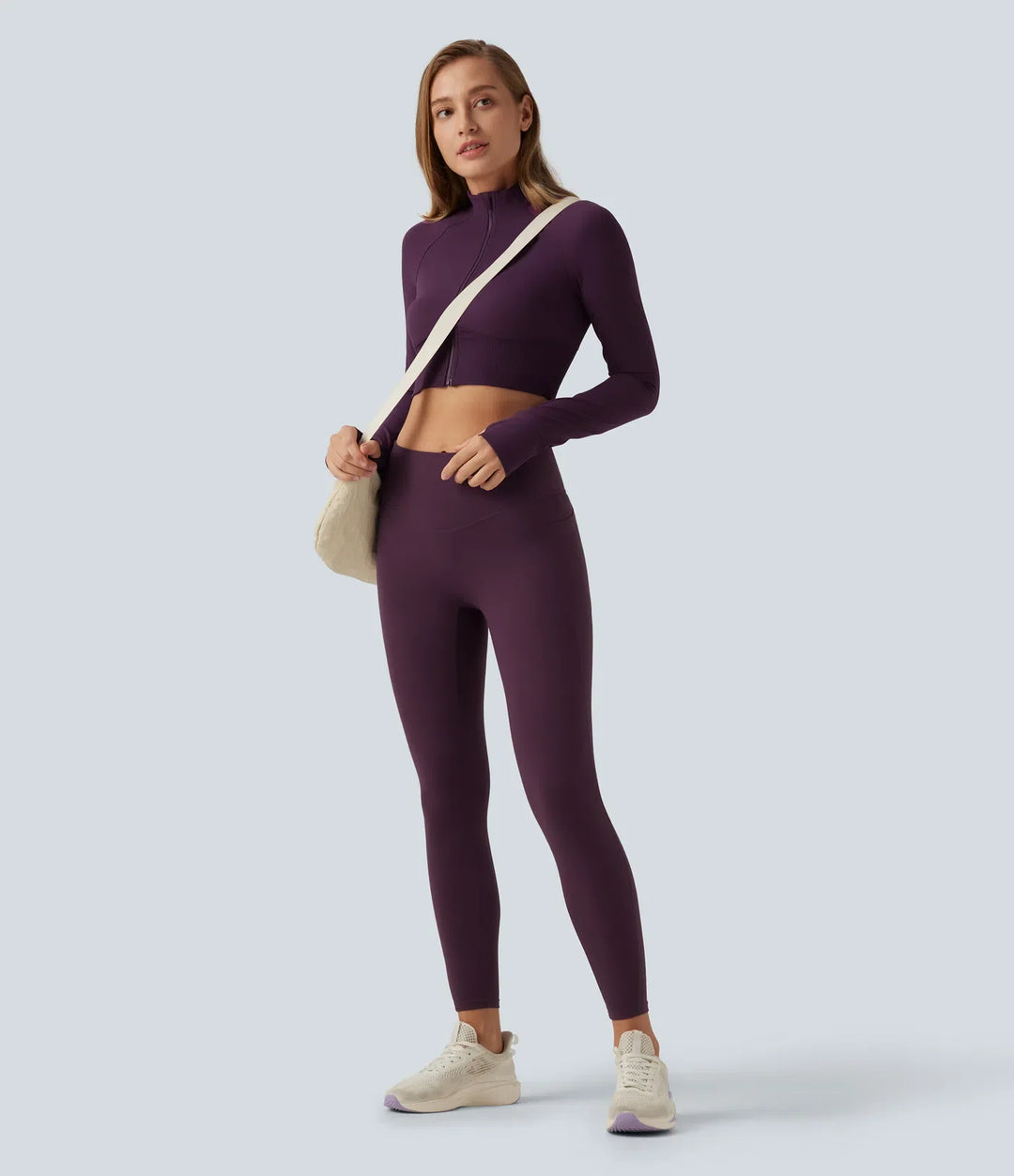 Lyckera UltraSculpt halvpolo lång raglanärm tumhål croppad yogajacka