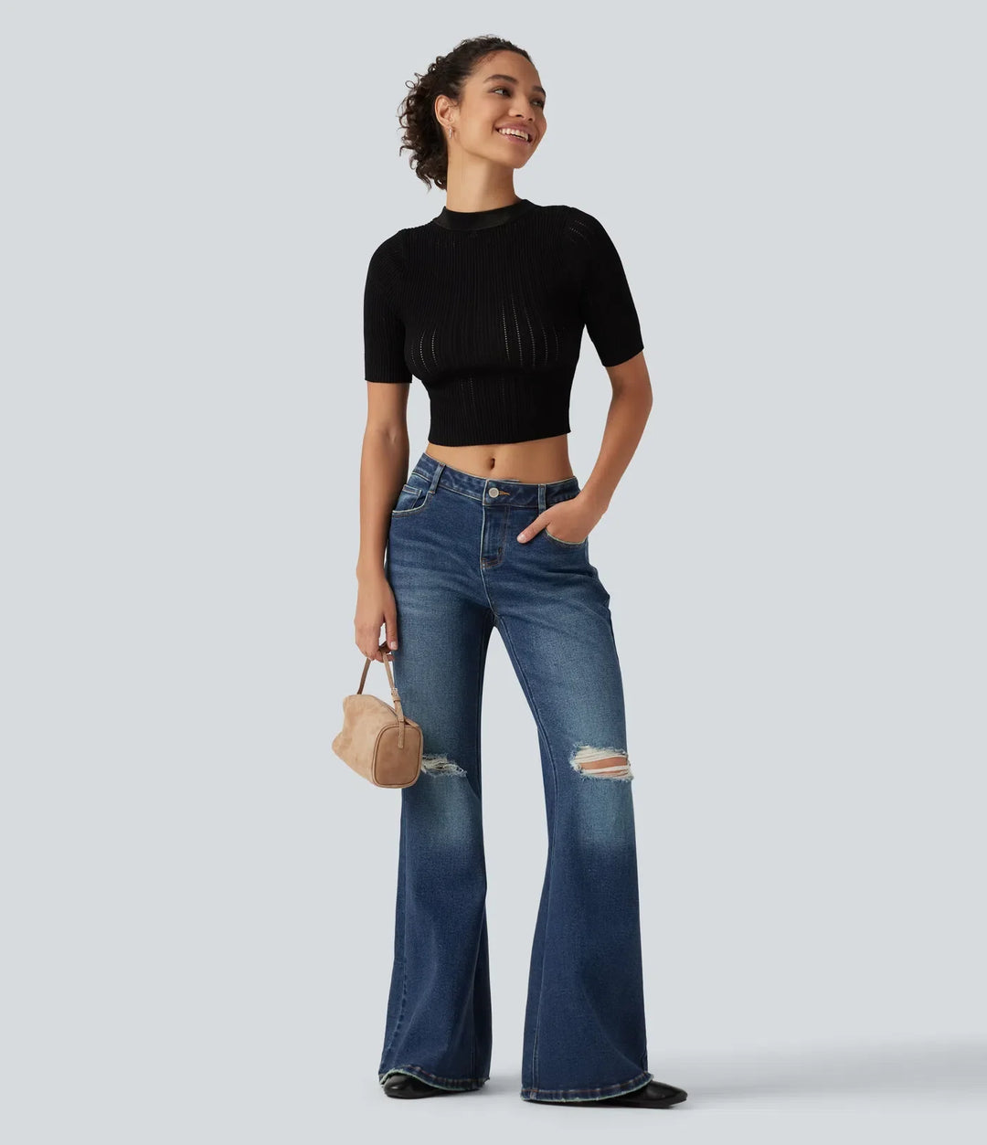 Låg midja vardaglig utsvängd jeans med fickor