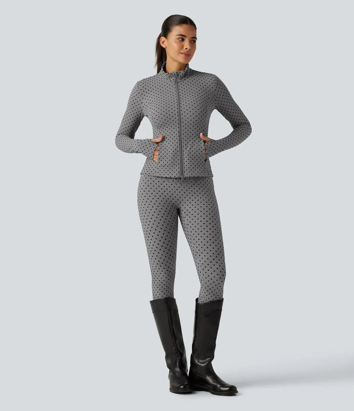 Lyckera UltraSculpt ståkrage långärmad tumhål veckad prickig yogajacka med fickor