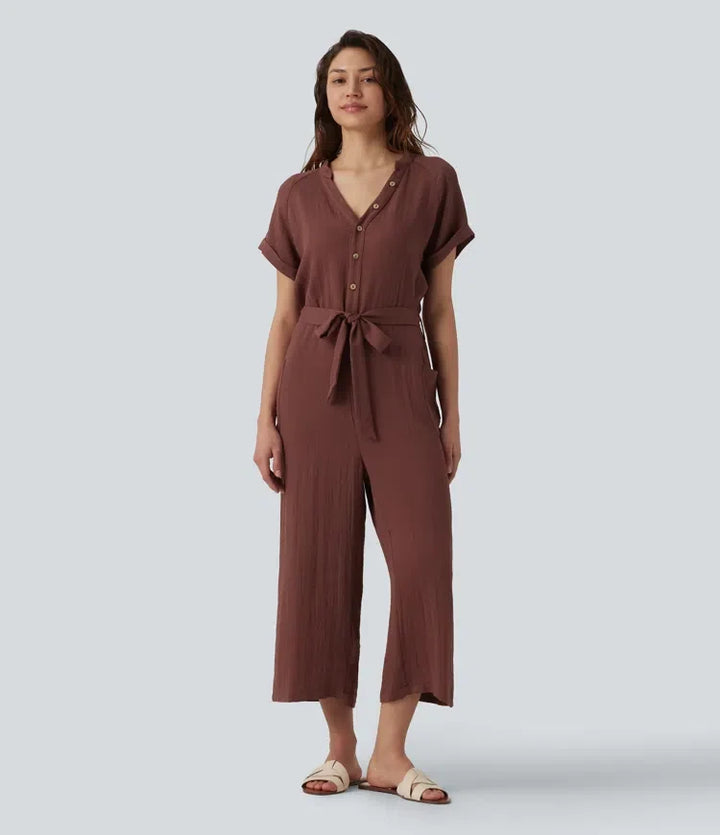 V-ringad kortärmad bältad croppad vardaglig baggy jumpsuit med fickor