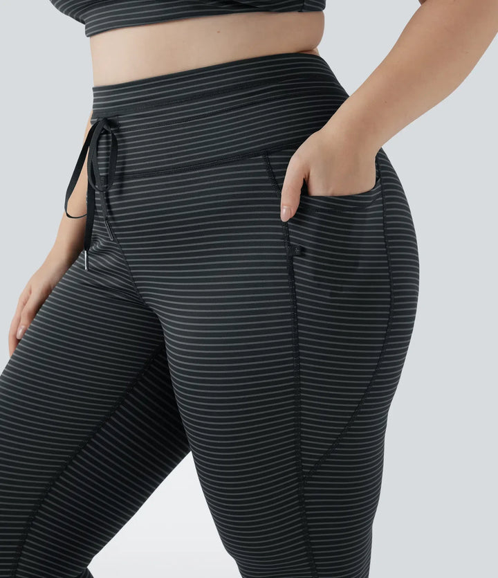 Med hög midja dragsko randig yoga leggings i plusstorlek med fickor