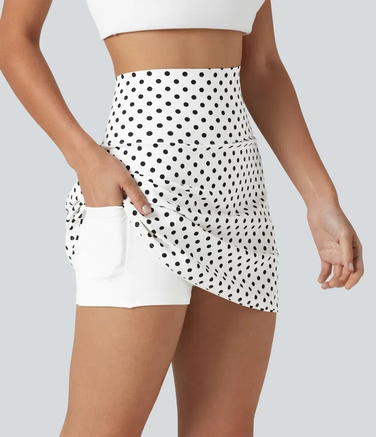 Med ultrahög midja magkontroll rundad nederkant 2-i-1 prickig golf mini kjol med fickor