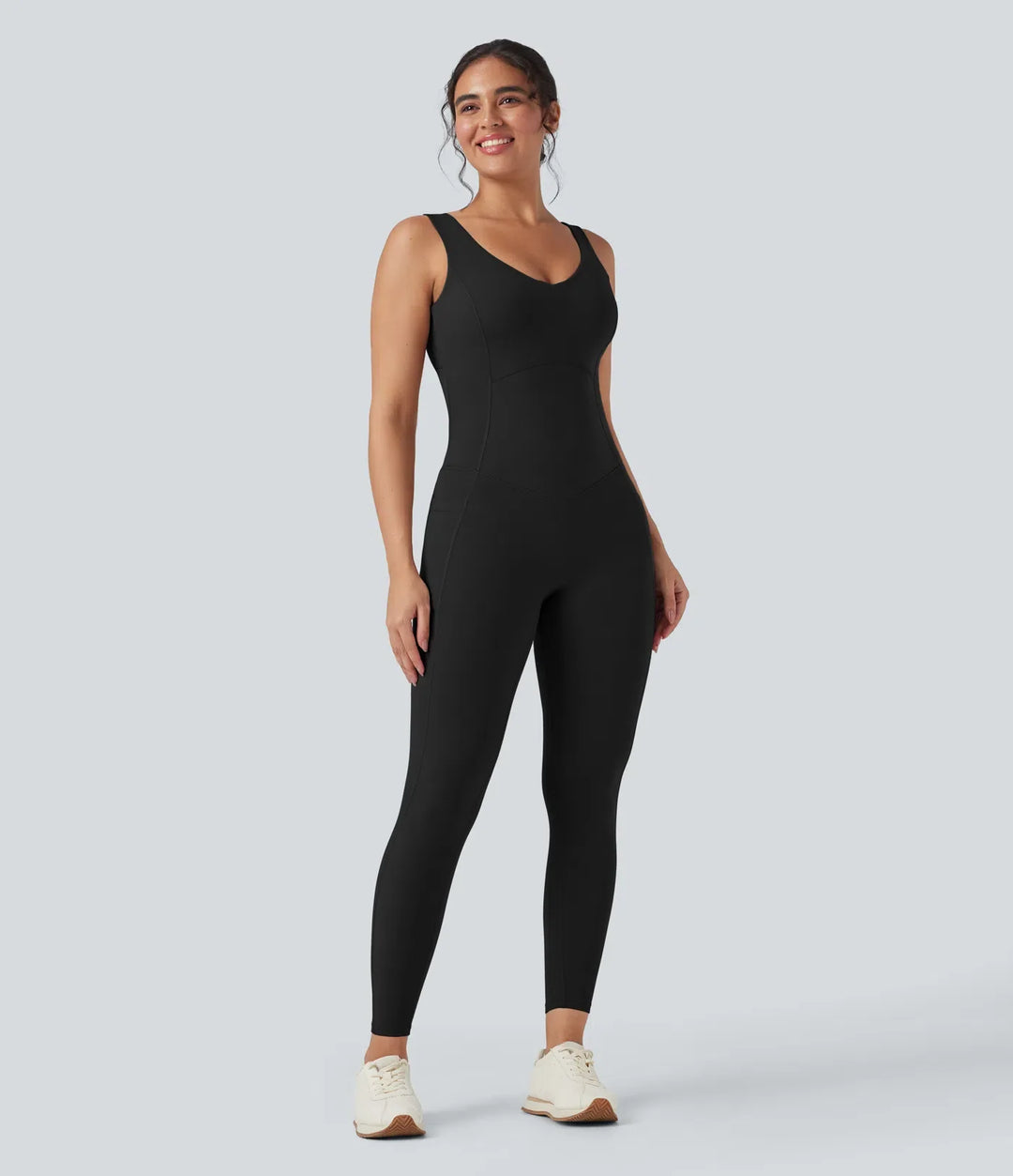 Halara UltraSculpt V-ringning magkontroll rumplyftande träning jumpsuit med fickor