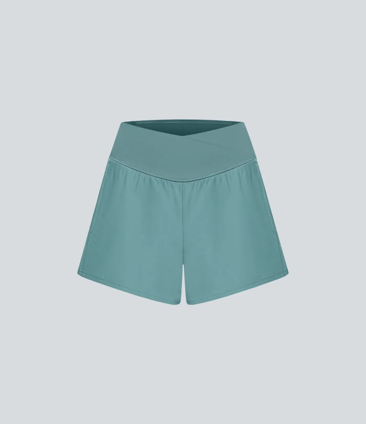 Breezeful med hög midja, omlottmidja och ficka 2-i-1 snabbtorkande yogashorts 4"