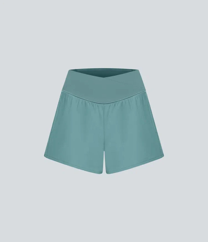Breezeful med hög midja, omlottmidja och ficka 2-i-1 snabbtorkande yogashorts 4"