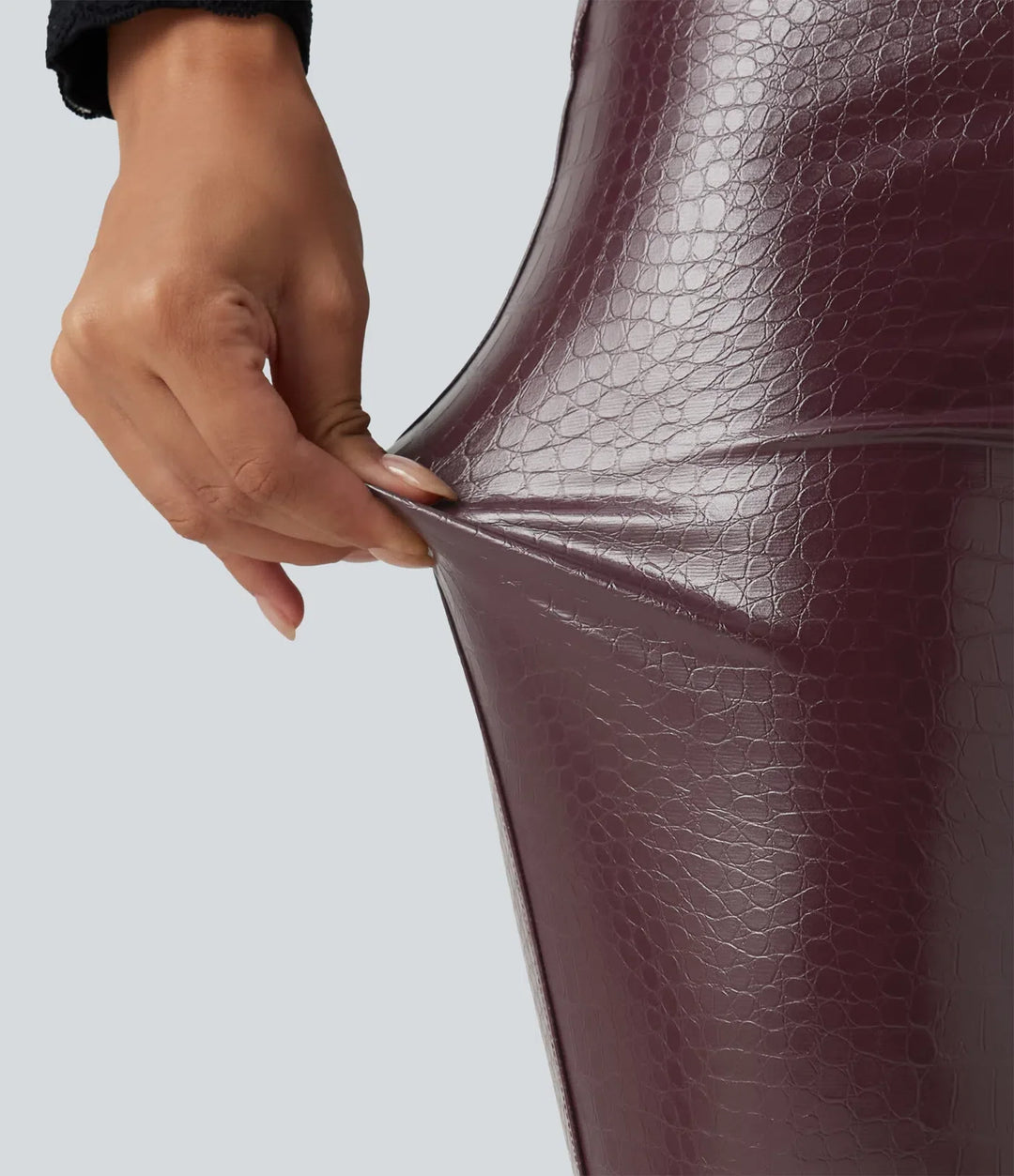 Med hög midja ormskinnsmönster tryck stretchig PU fleece vardagsleggings med fickor