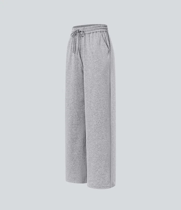 Högmidjad dragsko ficka vida ben baggy vardagsbyxor