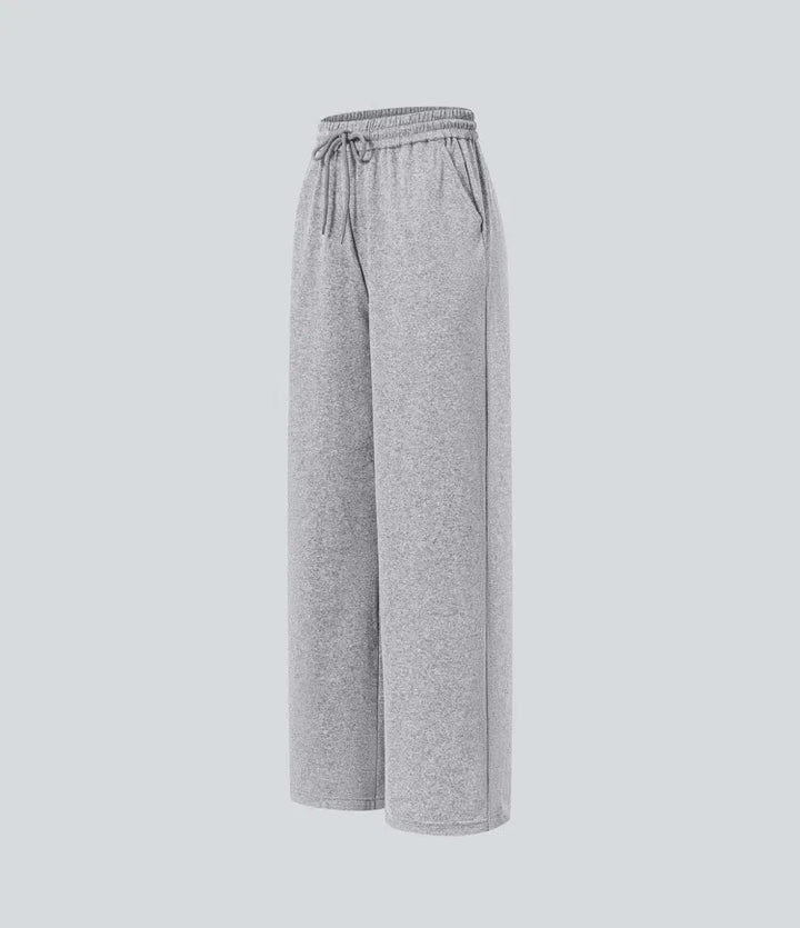 Högmidjad dragsko ficka vida ben baggy vardagsbyxor