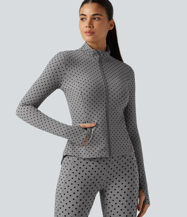 Lyckera UltraSculpt ståkrage långärmad tumhål veckad prickig yogajacka med fickor