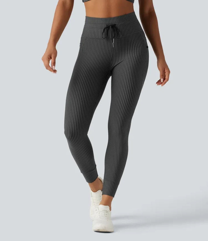 Med hög midja dragsko rand yogaleggings med fickor