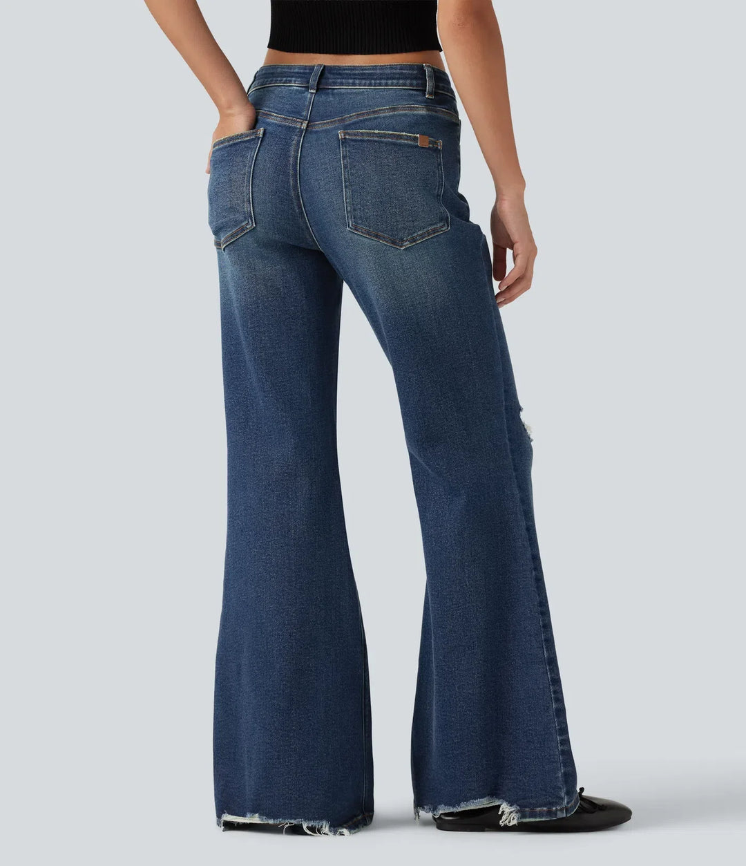 Låg midja vardaglig utsvängd jeans med fickor
