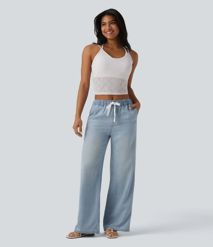 Medelhög midja dragsko vardagsjeans med fickor