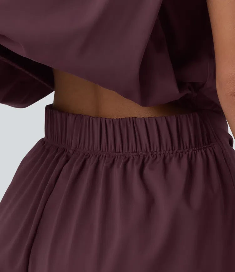 Rund halsringning ärmlös knytning framtill sval känsla playsuit för vardag med fickor – Easy Peezy – UPF50+