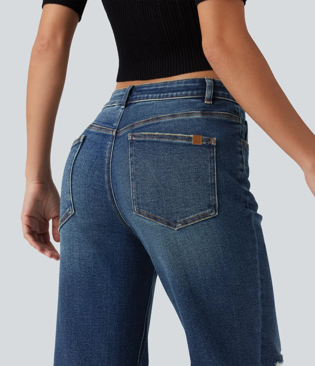 Låg midja vardaglig utsvängd jeans med fickor