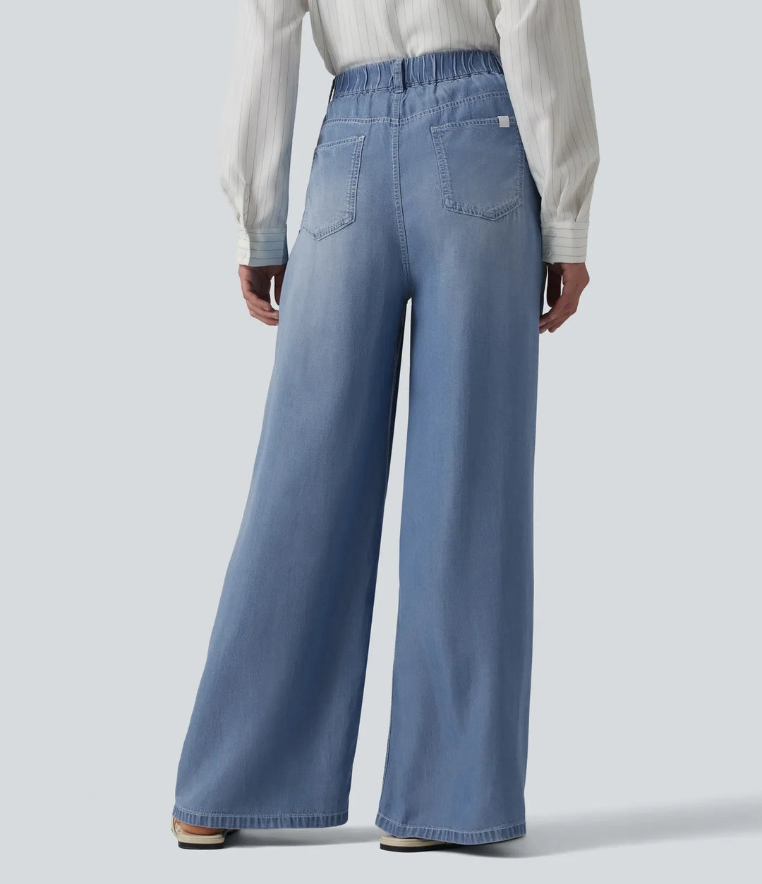 Högmidjad vida ben vardagsjeans med fickor